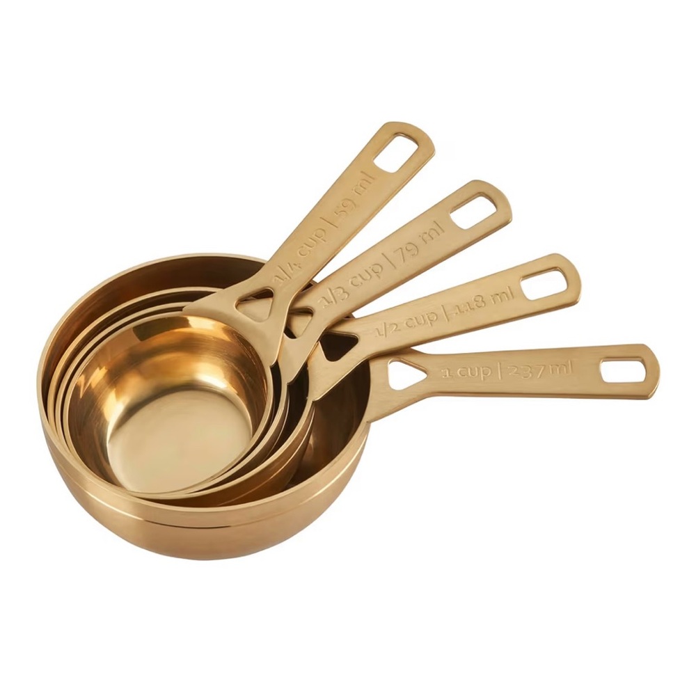 Le Creuset gold measuring cups